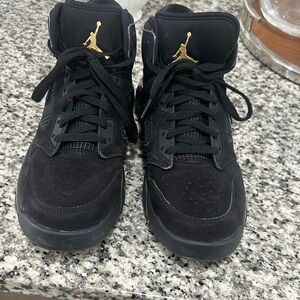 Jordan Black and Gold High-Top Sneakers